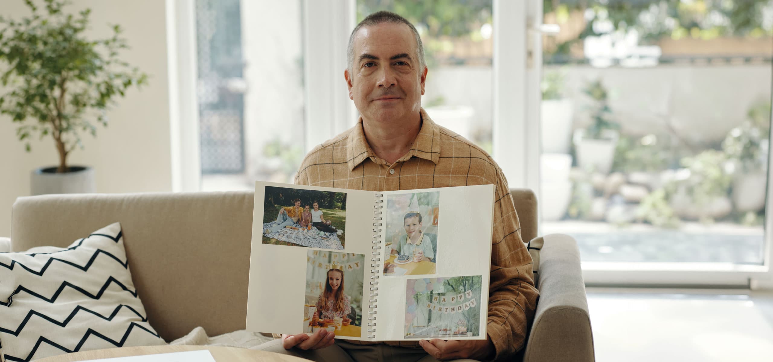 Donor family looking through a photobook